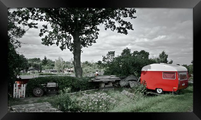 Red trailer parked next to a big tree Framed Print by Sandra Broenimann