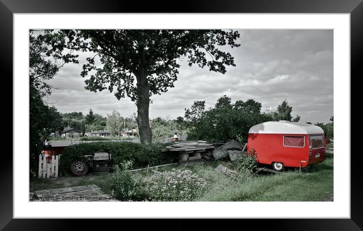 Red trailer parked next to a big tree Framed Mounted Print by Sandra Broenimann