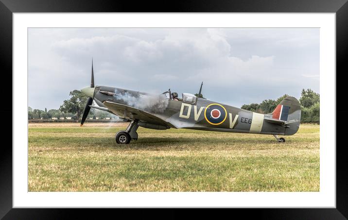 Spitfire starting up Framed Mounted Print by Alan Tunnicliffe