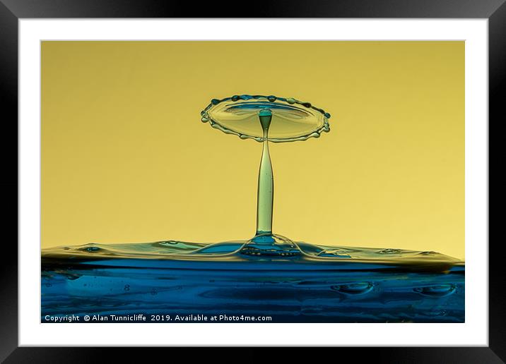 When water droplets collide Framed Mounted Print by Alan Tunnicliffe