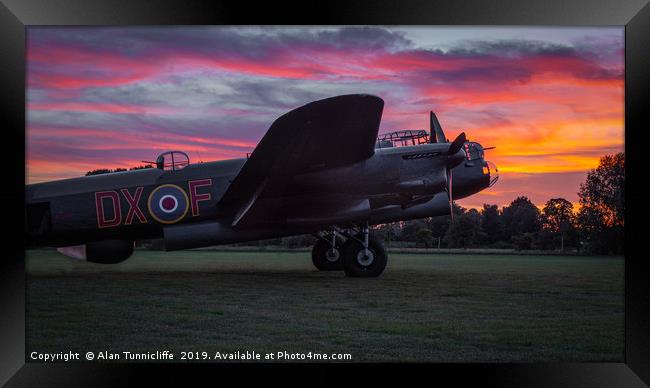 Lancaster bomber Just Jane with a sunset Framed Print by Alan Tunnicliffe
