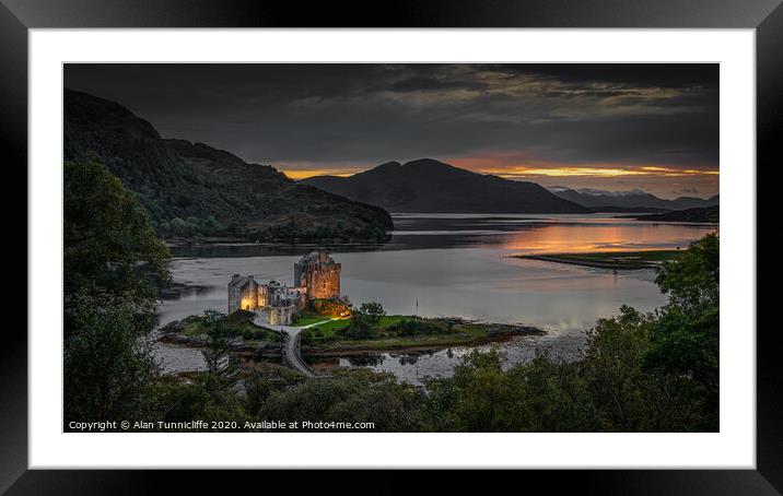Eilean Donan Castle at dusk. Framed Mounted Print by Alan Tunnicliffe