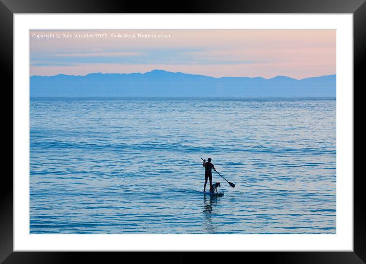 Paddle surfing  Framed Mounted Print by Ram Vasudev