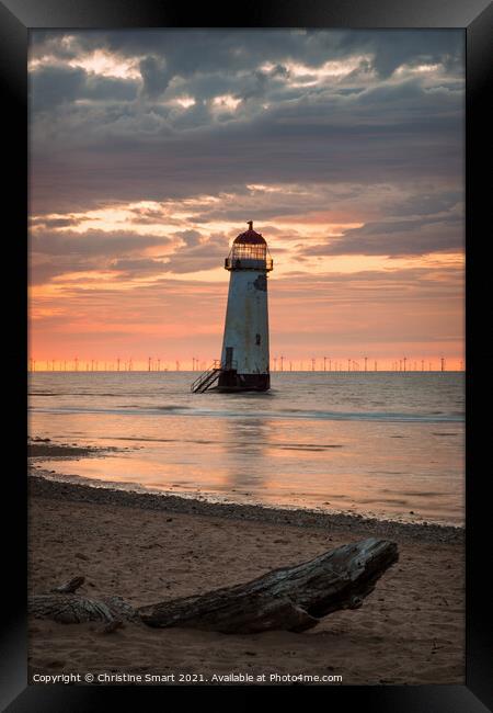 Talacre Lighthouse Driftwood Sunset Framed Print by Christine Smart