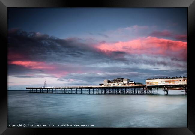 Sunset over Colwyn Bay Pier, North Wales Framed Print by Christine Smart