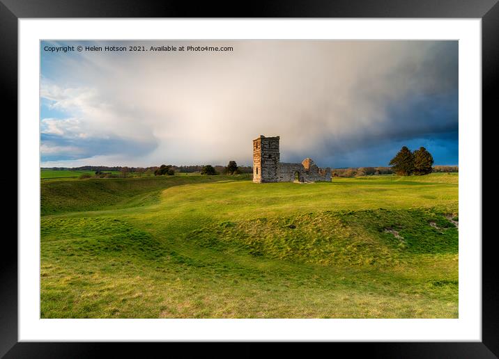 Dramatic skies over the old church at Knowlton  Framed Mounted Print by Helen Hotson