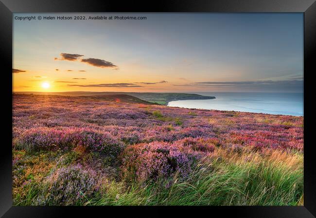 Sunset over heather in bloom on the North York Moors National Pa Framed Print by Helen Hotson
