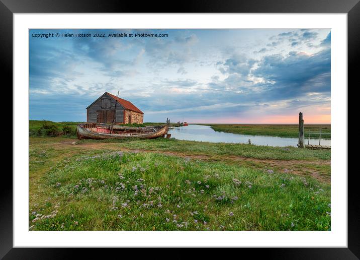 Dramatic sunrise sky over the old coal barn at Thornham Framed Mounted Print by Helen Hotson