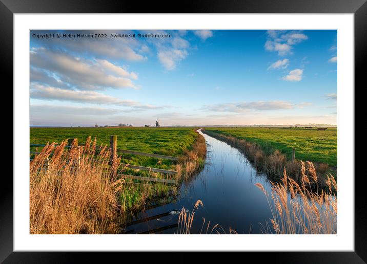 Looking out to Halvergate Mill on Berney Marshes  Framed Mounted Print by Helen Hotson
