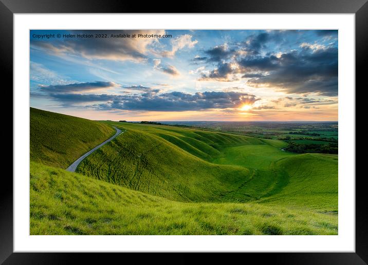 Dramatic sunset sky over The Manger at Uffington Framed Mounted Print by Helen Hotson