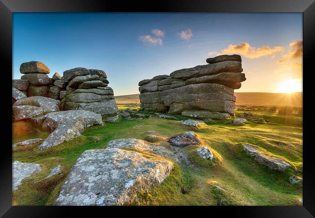 Beautiful sunset over granite rock formations at Combestone Tor  Framed Print by Helen Hotson