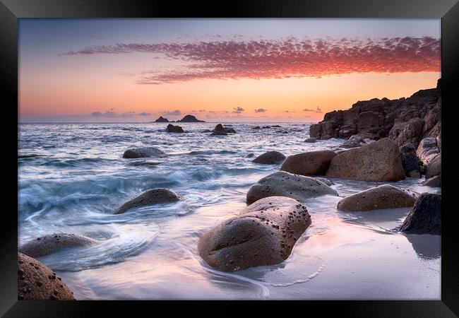 Sunset at Porth Nanven Cove in Cornwall Framed Print by Helen Hotson