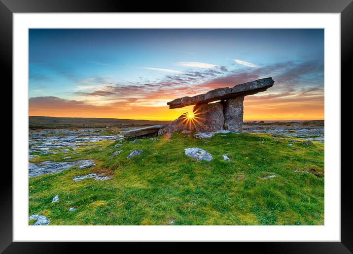 Sunset over Poulnabrone dolmen an ancient portal tomb in the Bur Framed Mounted Print by Helen Hotson