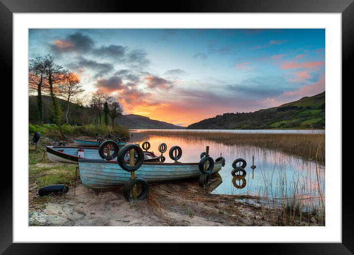 Beautiful sunrise over boats at Glencar Lough Framed Mounted Print by Helen Hotson