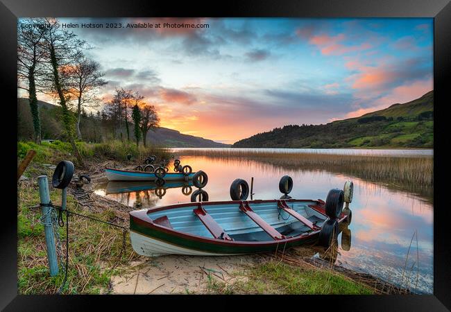 Beautiful sunrise over rowing boats at Glencar Lough Framed Print by Helen Hotson