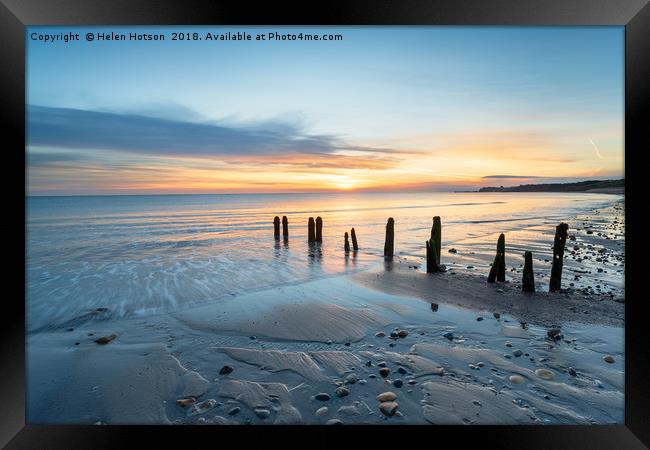 Sunrise at Sandsend Beach in Yorkshire Framed Print by Helen Hotson