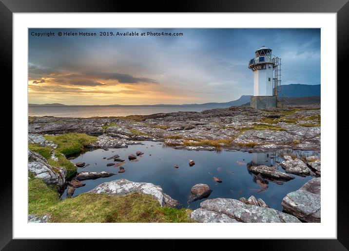 Stormy sunset at Rhe lighthouse near Ullapool  Framed Mounted Print by Helen Hotson