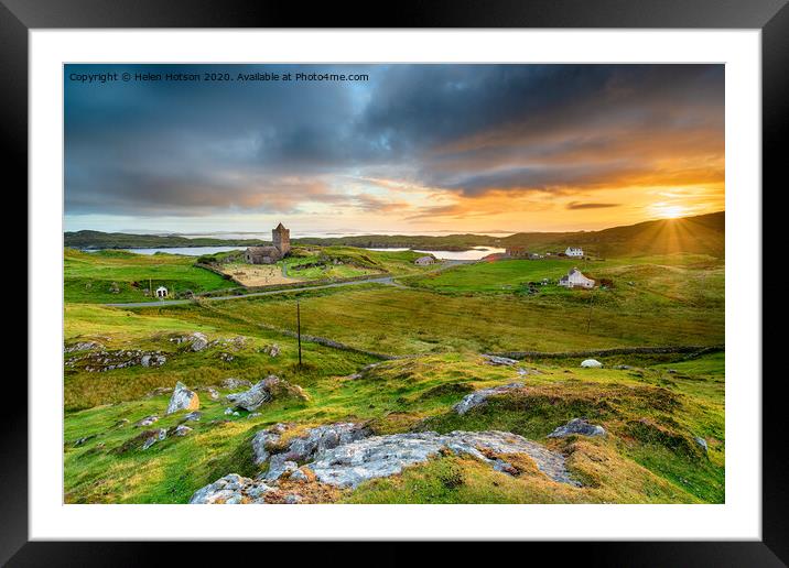 Beautiful sunset over the village of Rodel on the Isle of Harris  Framed Mounted Print by Helen Hotson