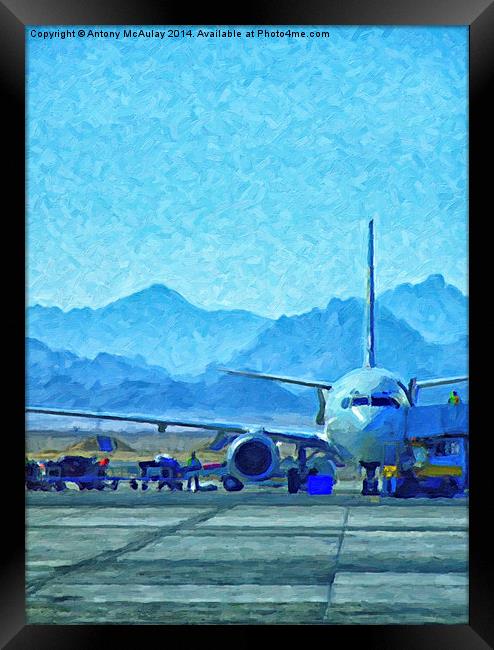 Aeroplane At Airport Framed Print by Antony McAulay