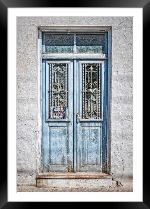 Old Blue Door on Crete Framed Mounted Print by Antony McAulay