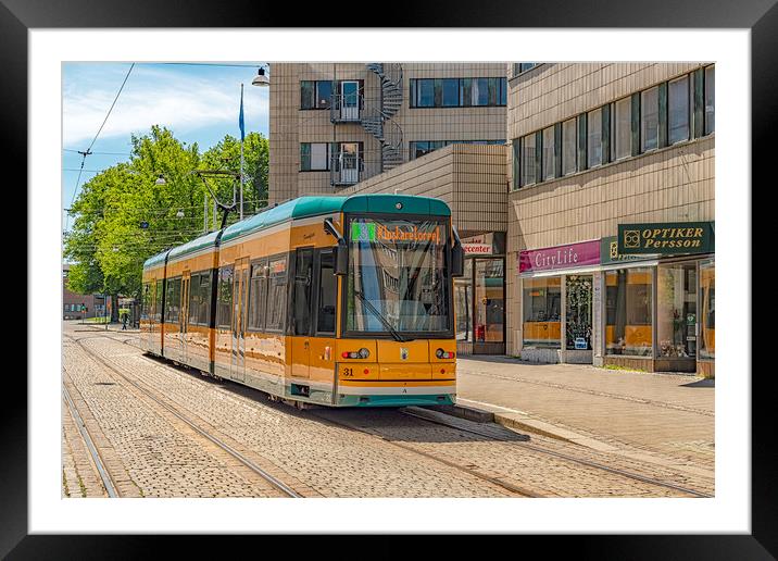 Norrkoping Passing Tram Car Framed Mounted Print by Antony McAulay