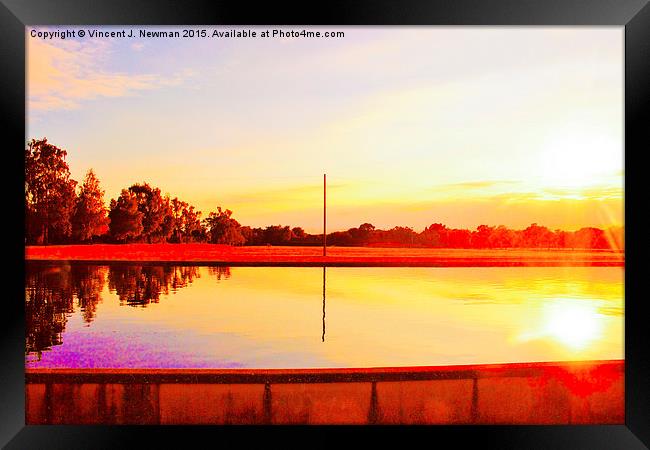  Sun Going Down Over Eaton Park Lake Framed Print by Vincent J. Newman