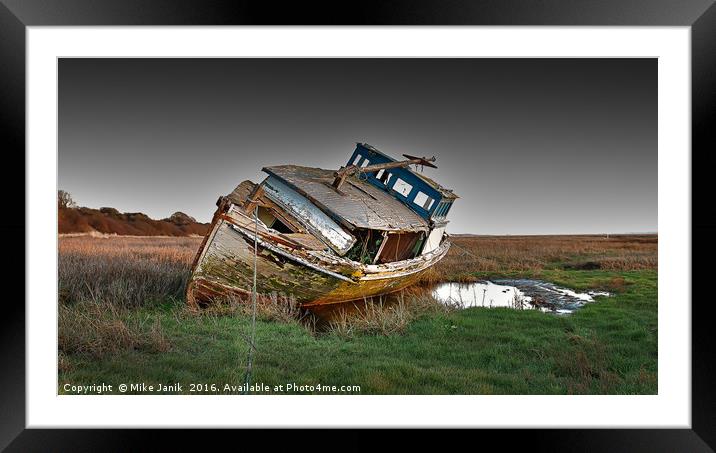 Stranded Boat Framed Mounted Print by Mike Janik