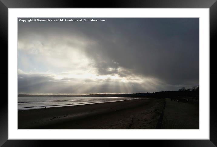 Atmospheric sunbeams Framed Mounted Print by Gwion Healy