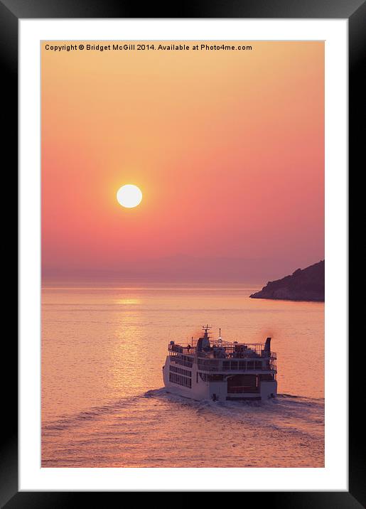 Passenger ferry at sunset Framed Mounted Print by Bridget McGill