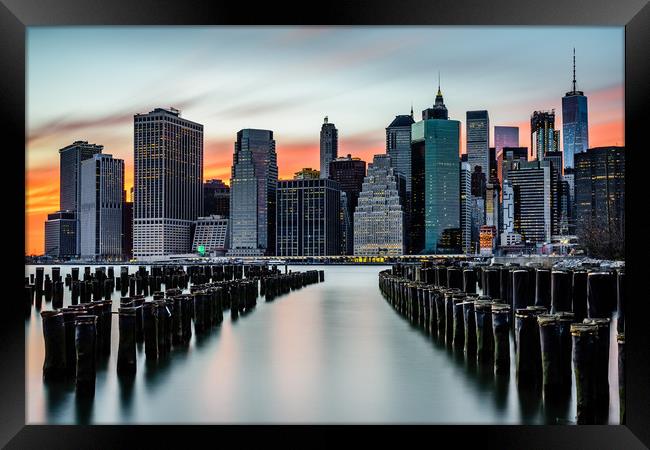New York Sunset Over The Manhattan Skyline Framed Print by Chris Curry