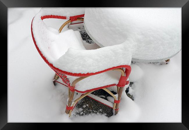 Snow-covered red chair Framed Print by Matthias Hauser
