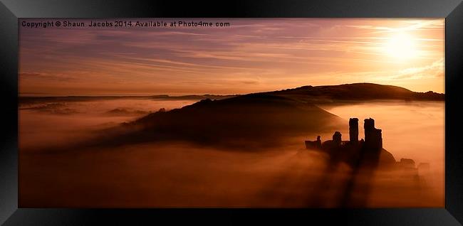 Corfe Castle through a misty sunrise Framed Print by Shaun Jacobs