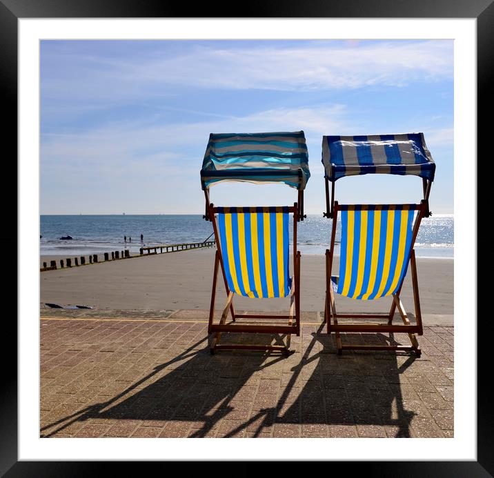 Deck chairs on the beach  Framed Mounted Print by Shaun Jacobs