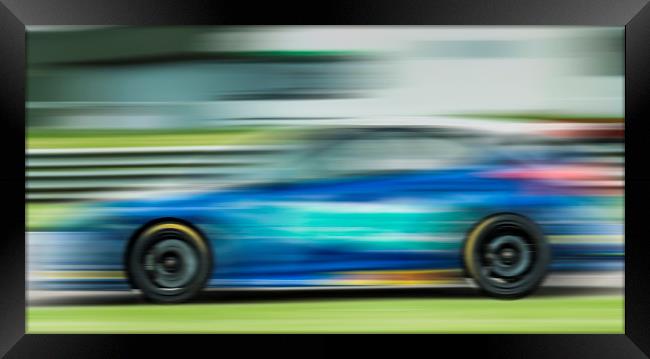 Racing car motion blur  Framed Print by Shaun Jacobs