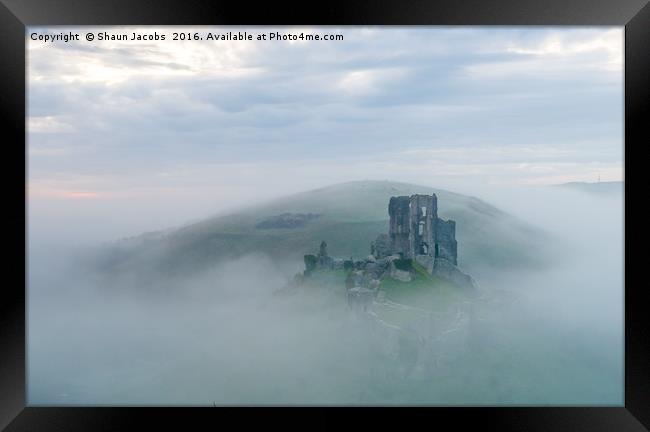 Corfe castle in the mist Framed Print by Shaun Jacobs