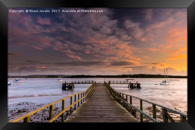 Looking down Lake pier  Framed Print by Shaun Jacobs