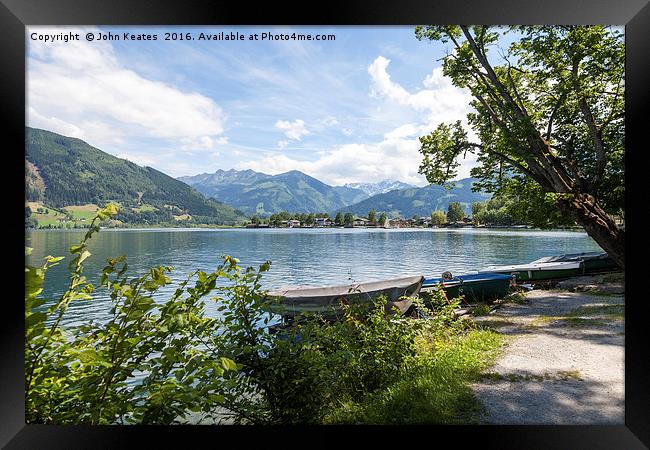 The lake at Zell am See Austria Framed Print by John Keates