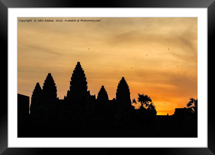 Sun rise at the Angkor Wat temple, Cambodia Framed Mounted Print by John Keates