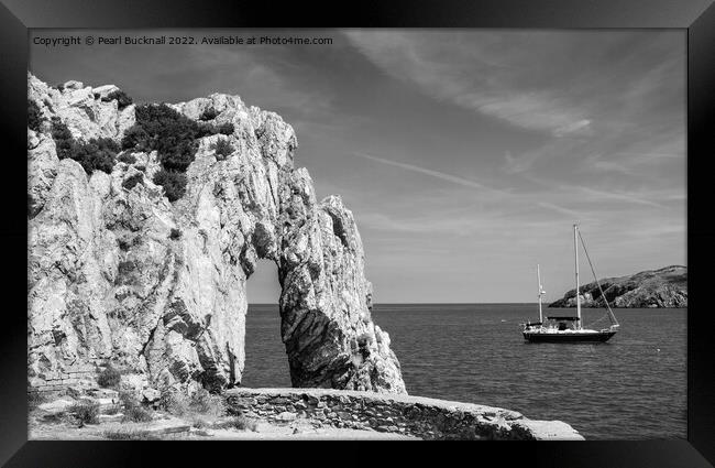 Rock Arch in the Bay Anglesey Coast Black and Whit Framed Print by Pearl Bucknall