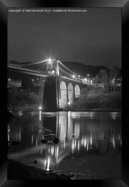 Illuminated Menai Bridge: Reflections at Night Framed Print by Pearl Bucknall
