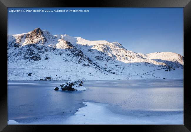 Snowy Y Garn across Frozen Llyn Idwal Snowdonia Framed Print by Pearl Bucknall