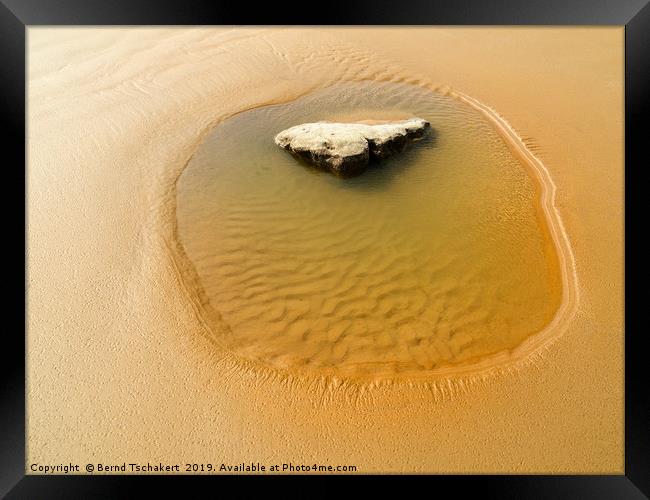 Beach rock puddle, Wales, UK Framed Print by Bernd Tschakert