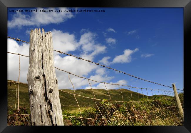 Old barb wire fence, Rhossili bay, Gower, Wales,UK Framed Print by Bernd Tschakert