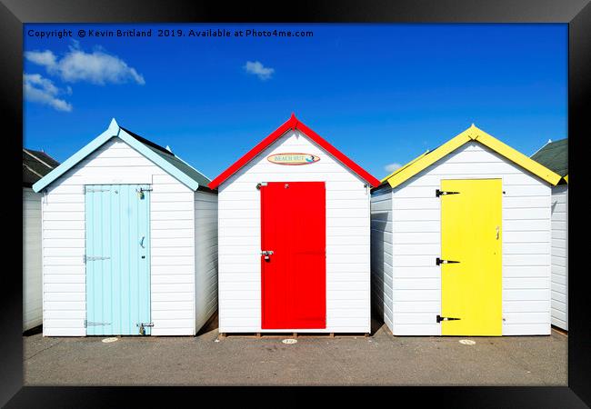 seaside beach huts Framed Print by Kevin Britland