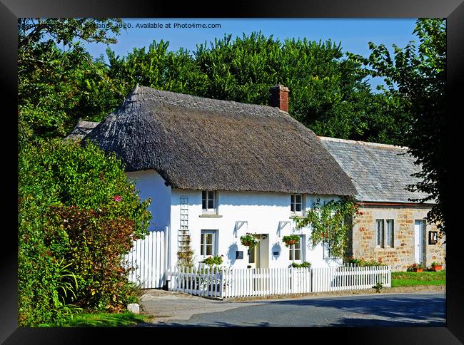 Pretty thatched cottage Framed Print by Kevin Britland