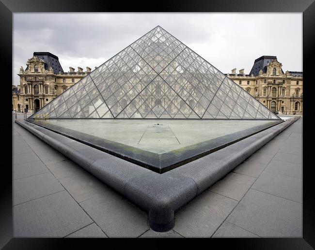 The Louvre Museum Glass Pyramid Framed Print by Luc Novovitch
