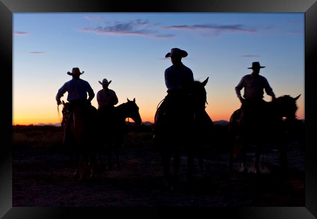 Cowboys at sunrise Framed Print by Luc Novovitch