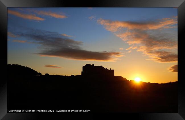 Bamburgh Castle at Sunset Framed Print by Graham Prentice