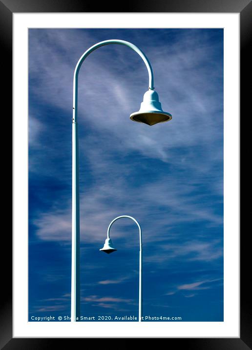 Jetty lamp standards Framed Mounted Print by Sheila Smart