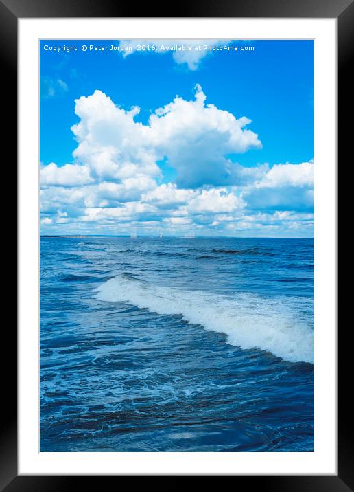 North Sea spring sunshine blue sky  with cumulus c Framed Mounted Print by Peter Jordan